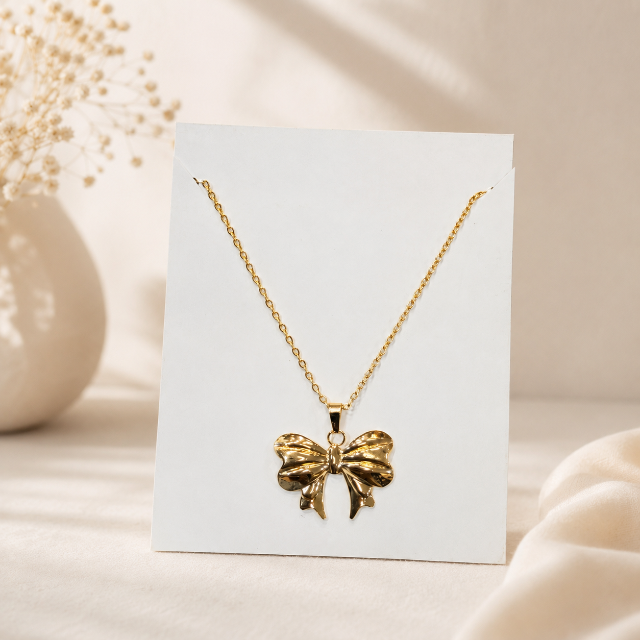Bow Pendant