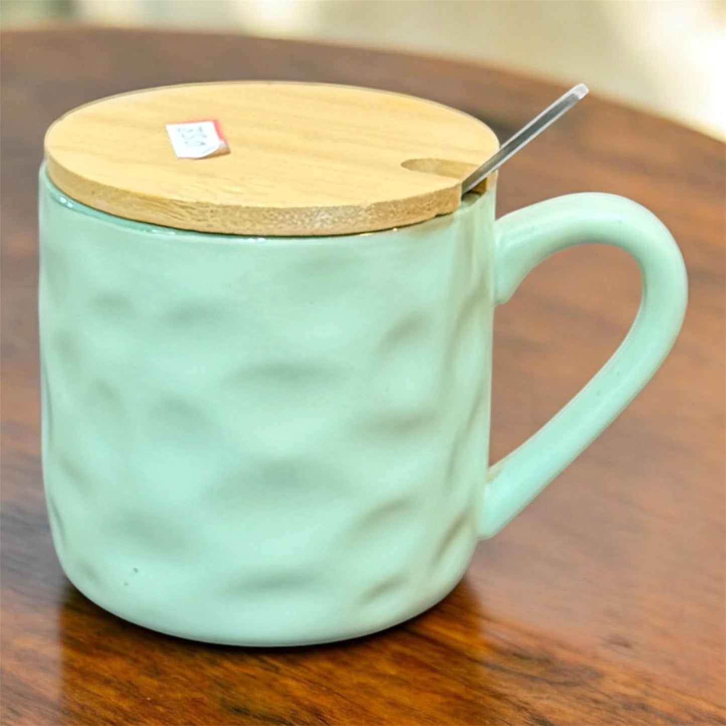 Mug with lid and spoon